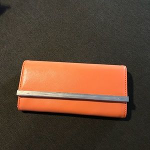 Nine west orange wallet. new with tags